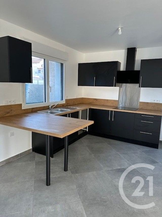 maison à louer - 4 pièces - 91.07 m2 - STE GENEVIEVE DES BOIS - 91 - ILE-DE-FRANCE - Century 21 Accord Immobilier